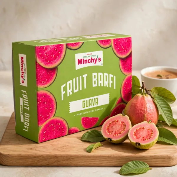 Minchy's Guava Fruit Barfi 250 g box with fresh guava fruit on a wooden board